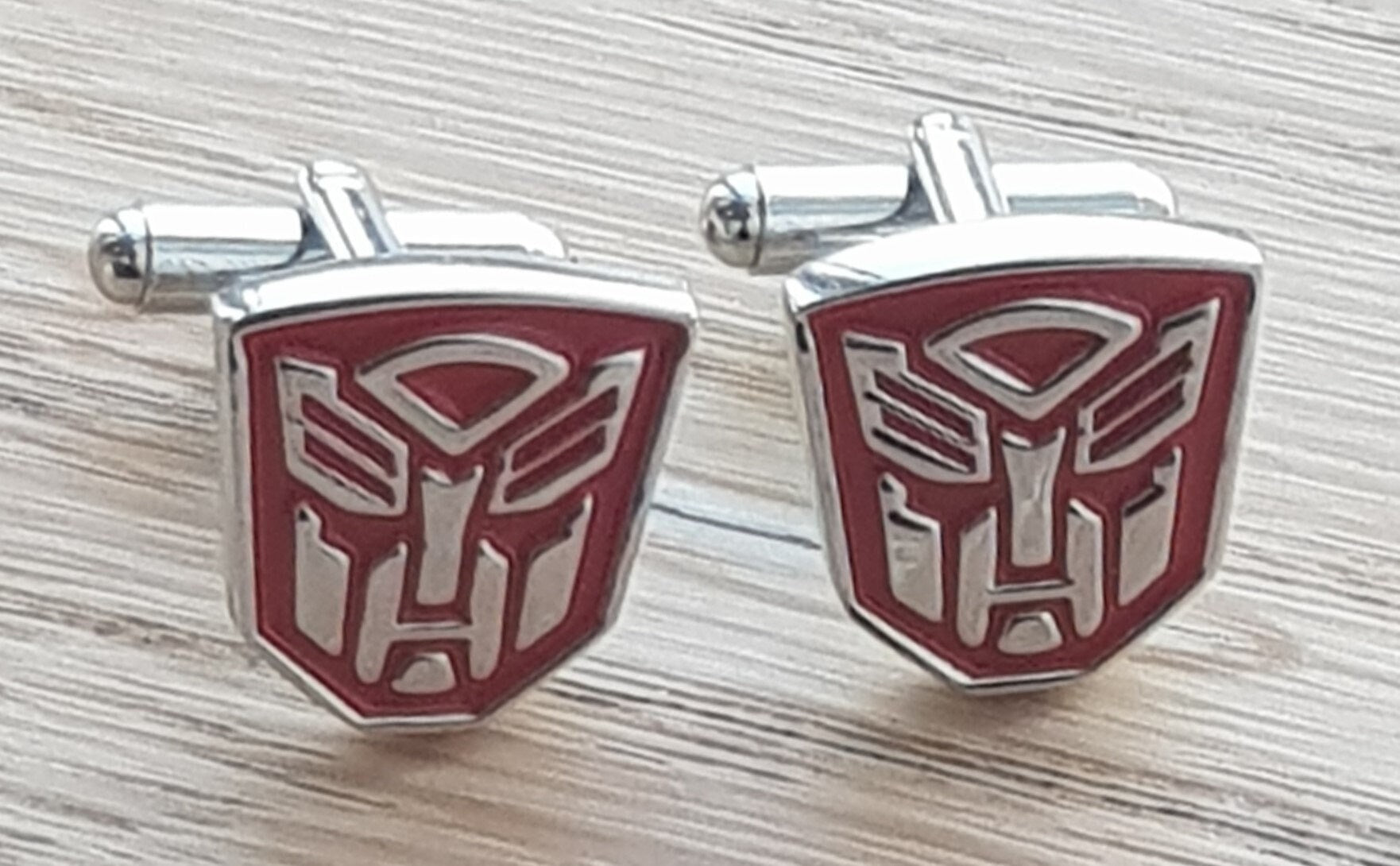 Transformers Autobots Cufflinks Perfect for Fans and Collectors Unique and Stylish Ideal for Special Events or Everyday Wear Great Gift Idea